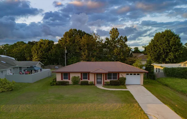 a view of a house with garden