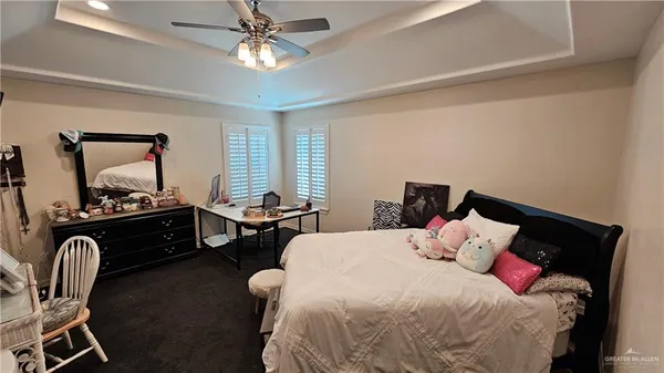 a bed room with a bed and a window