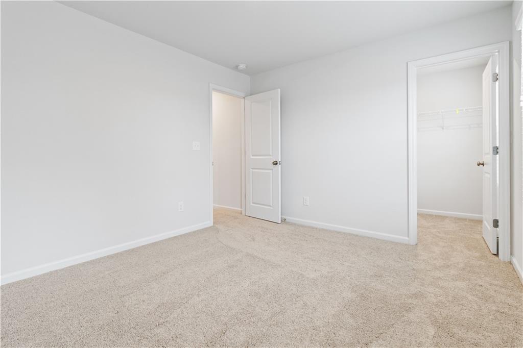 5113 Sidney Sq Drive Flowery Branch, GA 30542 - Photo 28 of 35 a view of an empty room