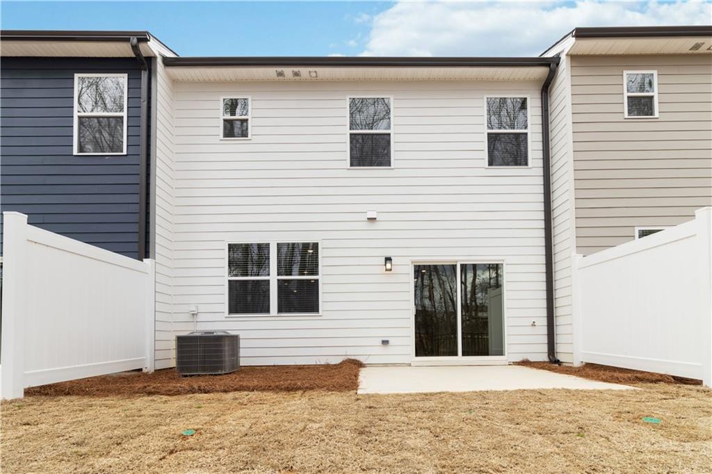 5113 Sidney Sq Drive Flowery Branch, GA 30542 - Photo 31 of 35 a view of a house with a window