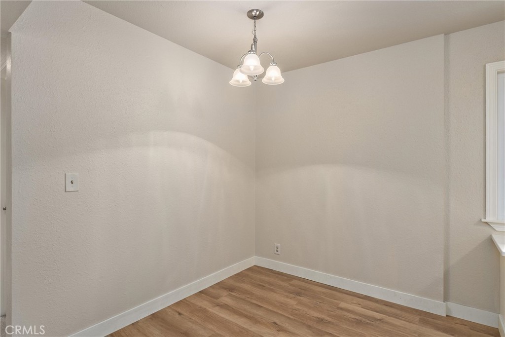 2737 House Avenue Durham, CA 95938 - Photo 12 of 49 a view of a small space with wooden floor and a window