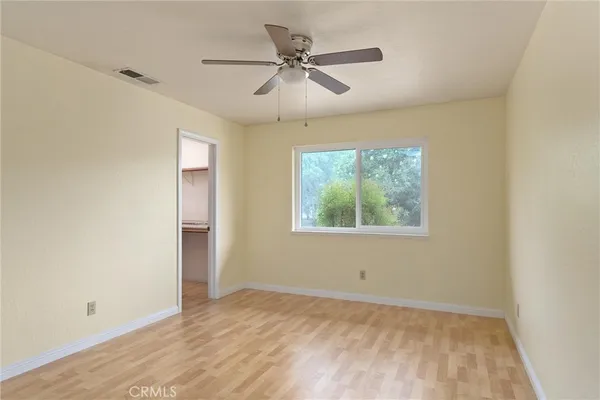 a view of a room with rack on the wall