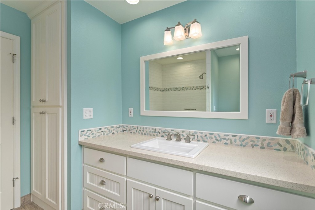 2737 House Avenue Durham, CA 95938 - Photo 28 of 49 a bathroom with a sink and a mirror