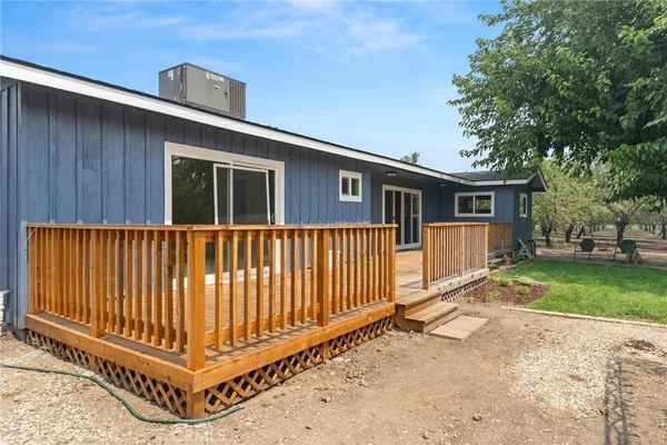 a house view with a backyard space