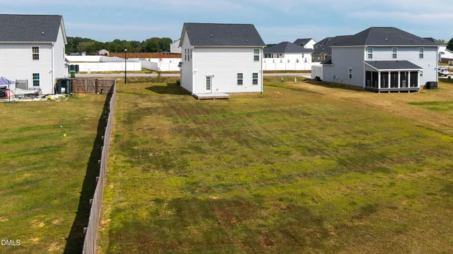 a house view with swimming pool
