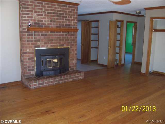 18400 River Road Chesterfield, VA 23838 - Photo 8 of 13 a view of an empty room with a fireplace
