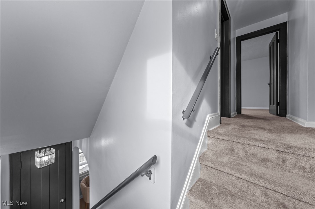 1193 Mayfield Ridge Road Cleveland, OH 44124 - Photo 19 of 35 Stairway featuring carpet and baseboards