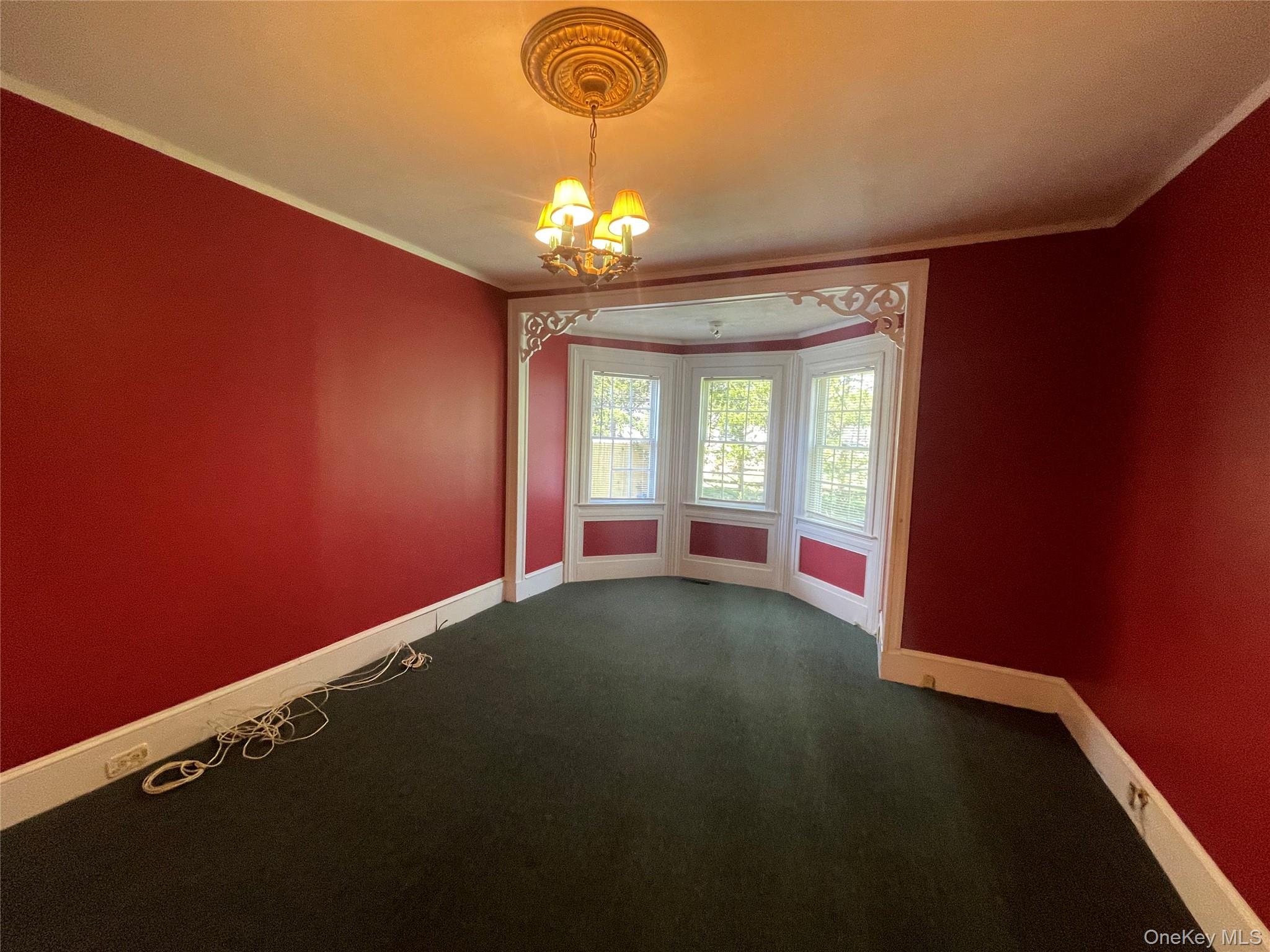 496 North Country Road St. James, NY 11780 - Photo 8 of 18 a view of an empty room with a window