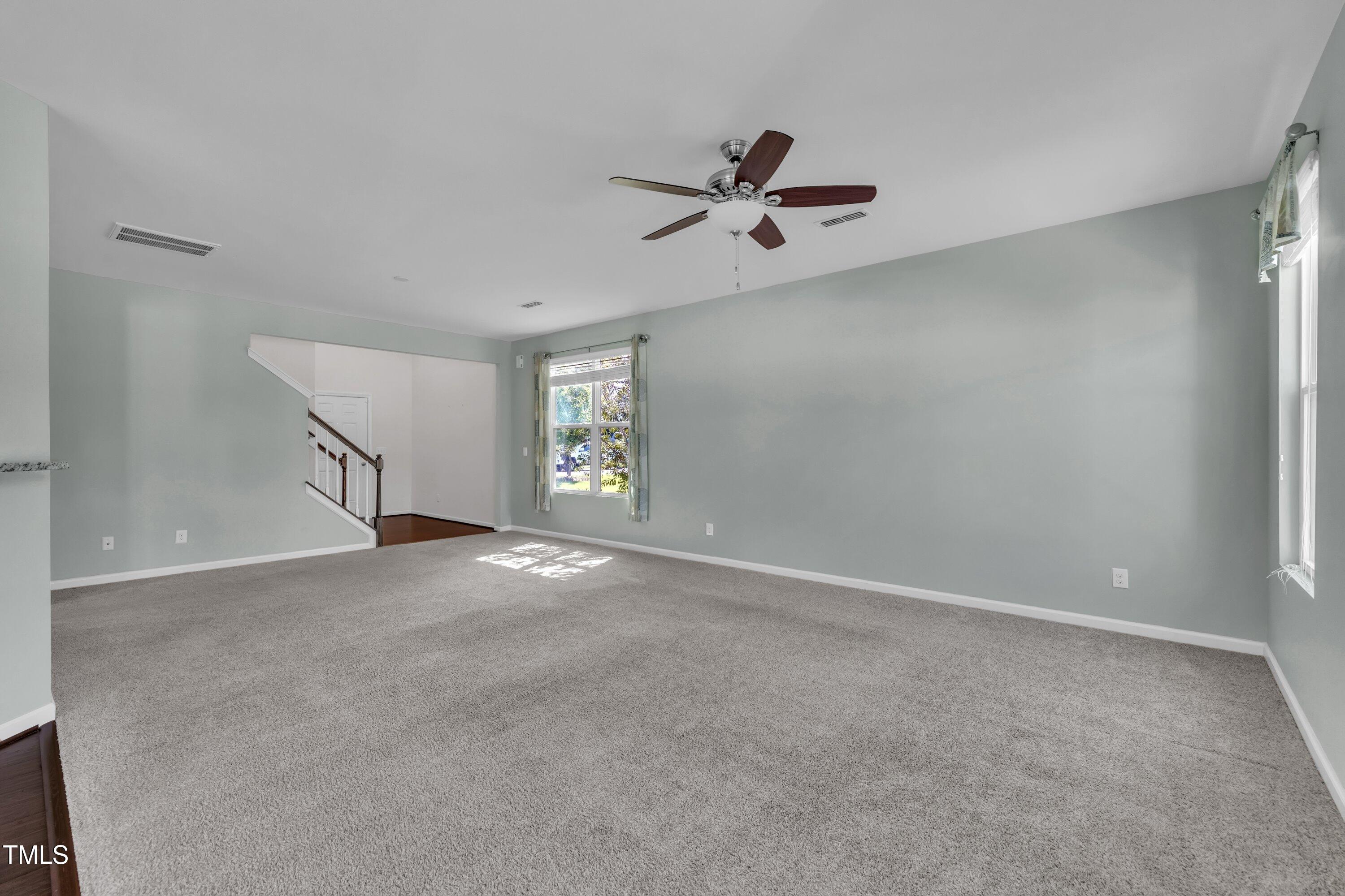 3519 Winding Walk Court Raleigh, NC 27616 - Photo 12 of 43 a view of an empty room with a window