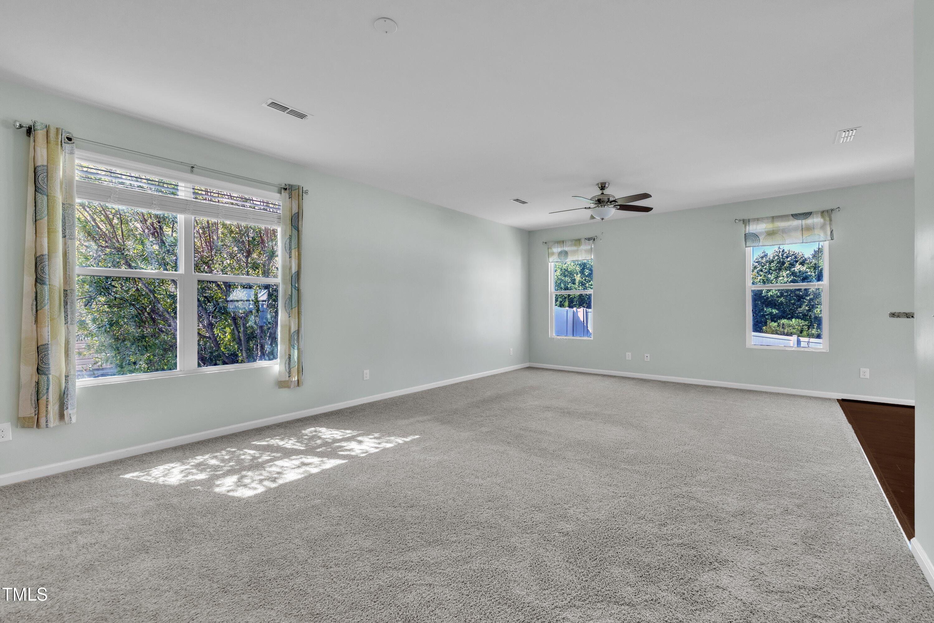 3519 Winding Walk Court Raleigh, NC 27616 - Photo 14 of 43 a view of livingroom with window