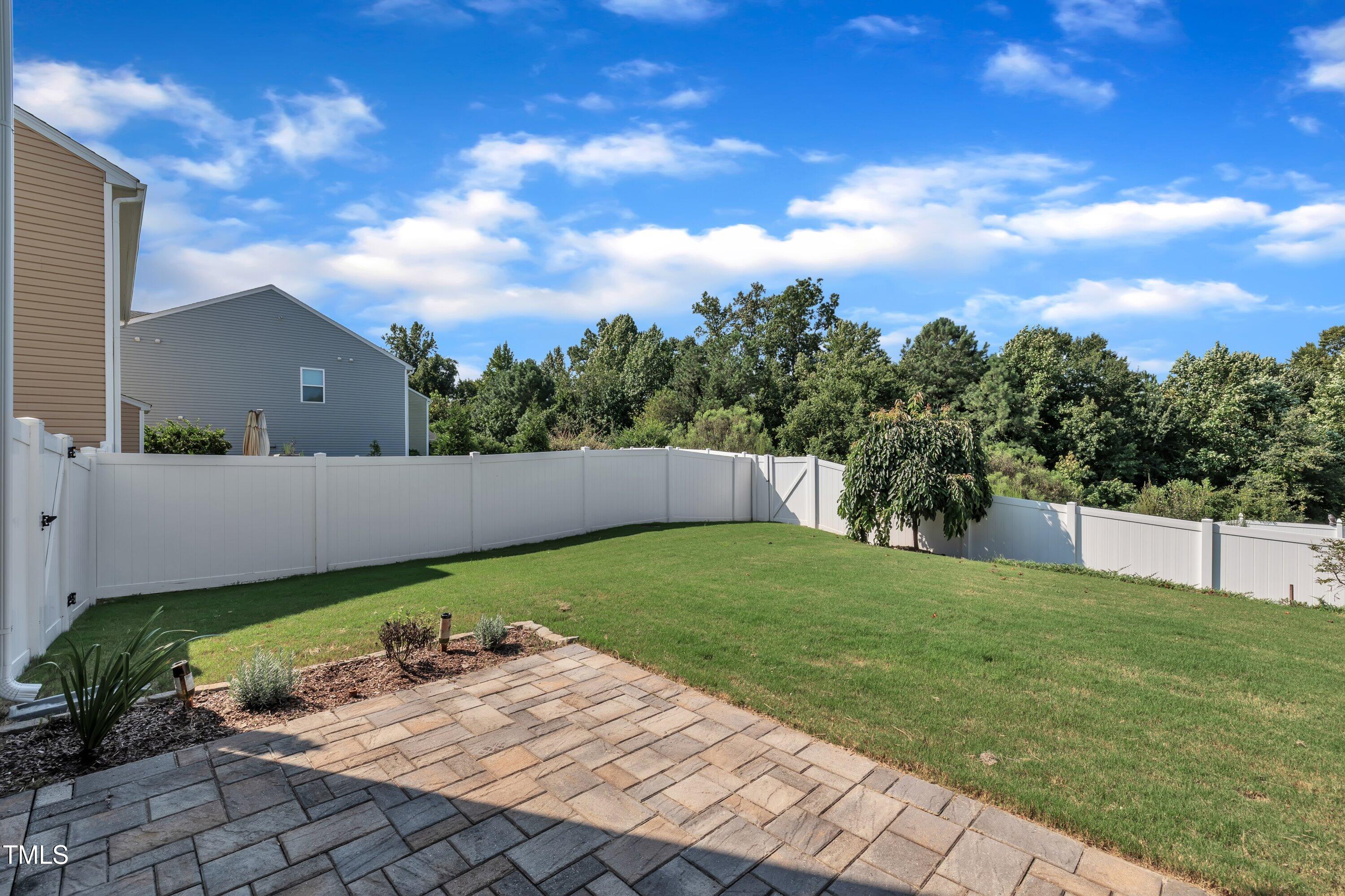 3519 Winding Walk Court Raleigh, NC 27616 - Photo 37 of 43 a view of a backyard with a garden
