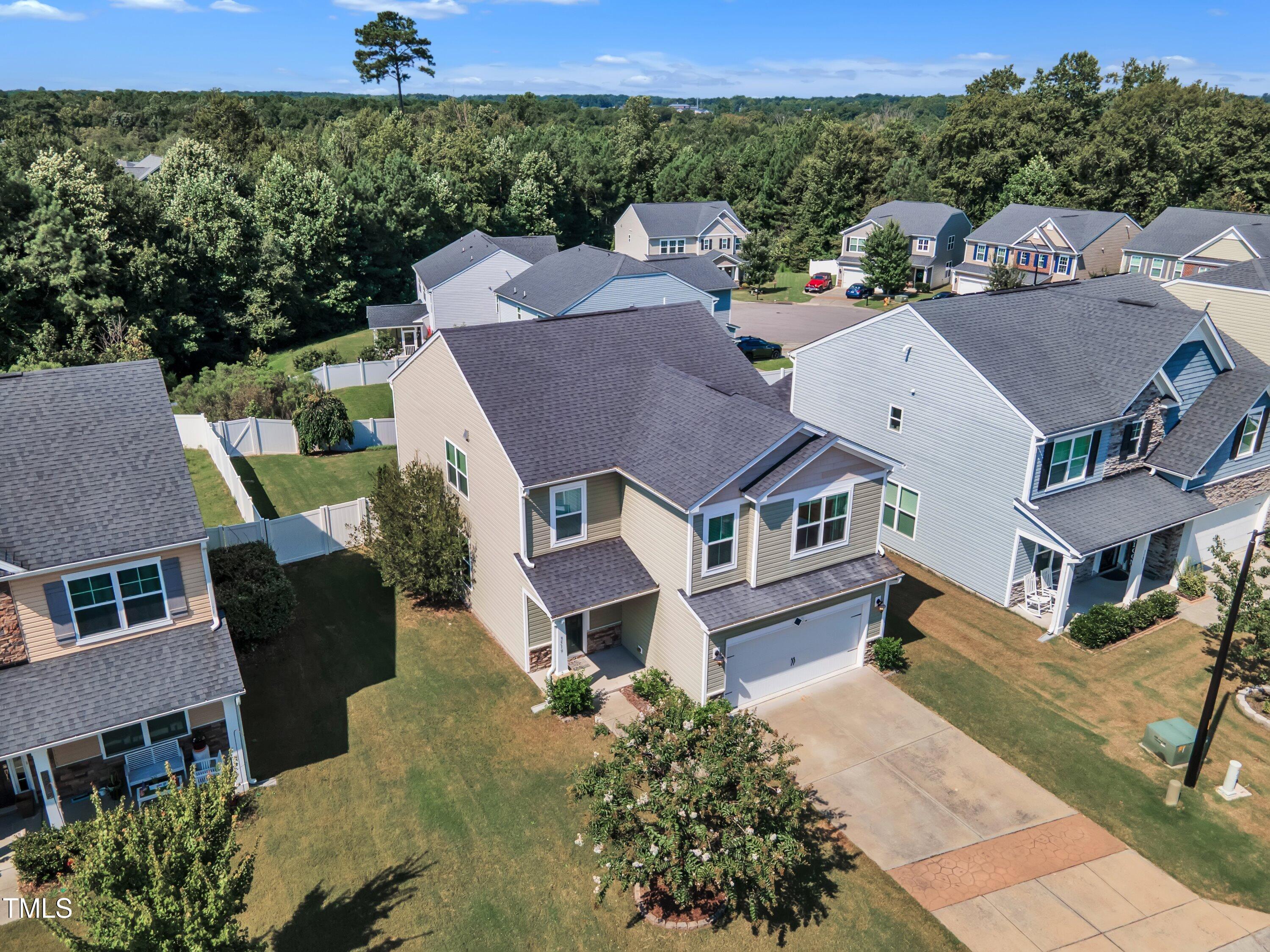 3519 Winding Walk Court Raleigh, NC 27616 - Photo 39 of 43 an aerial view of multiple houses with a big yard