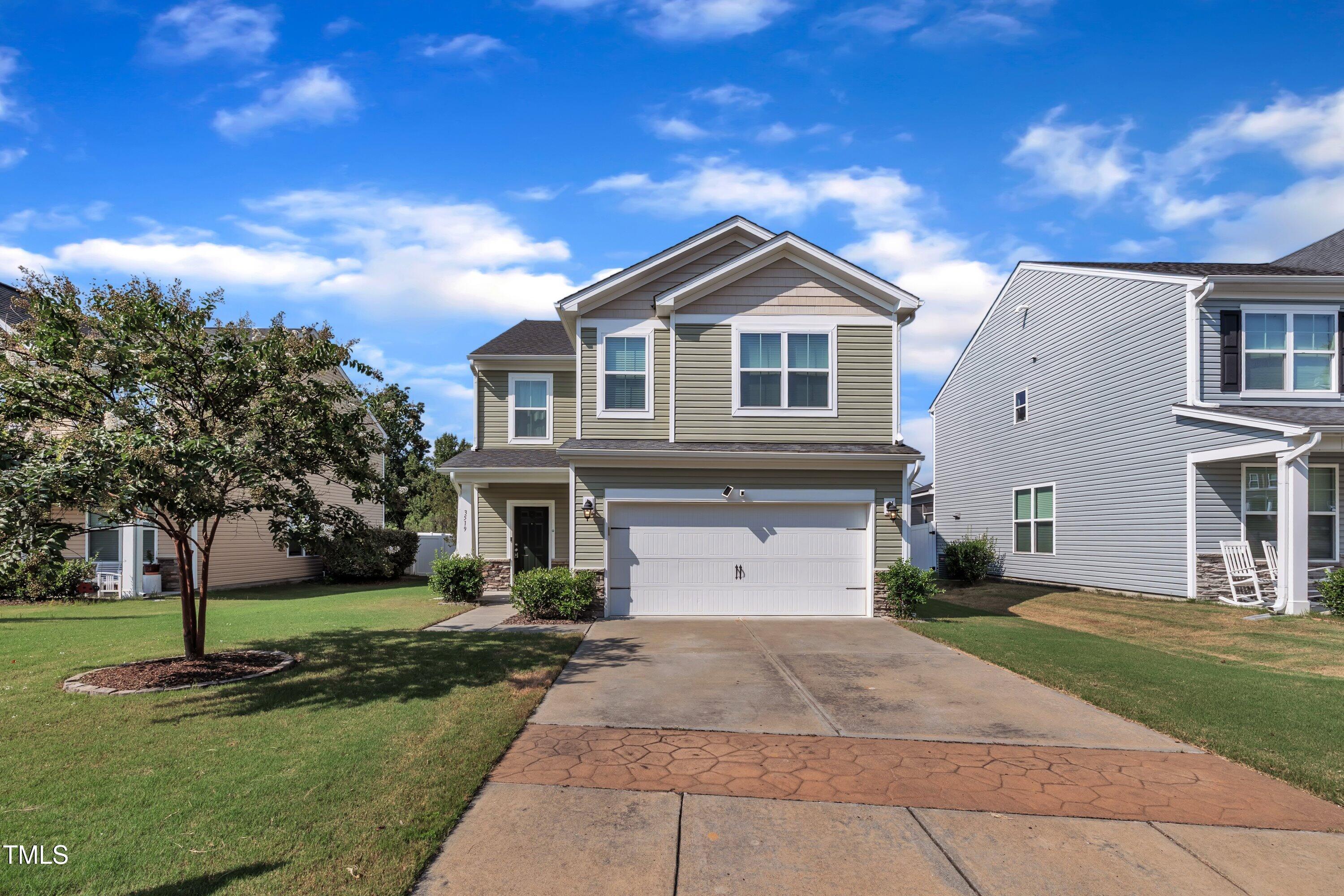 3519 Winding Walk Court Raleigh, NC 27616 - Photo 43 of 43 a front view of a house with a yard