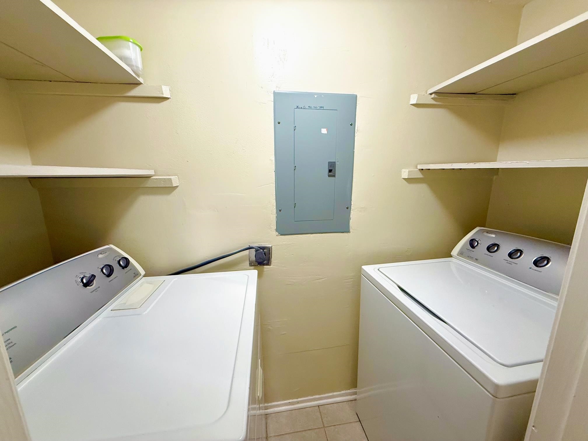 6571 Poplar Avenue, Unit 2 Germantown, TN 38138 - Photo 18 of 18 a utility room with dryer and washer