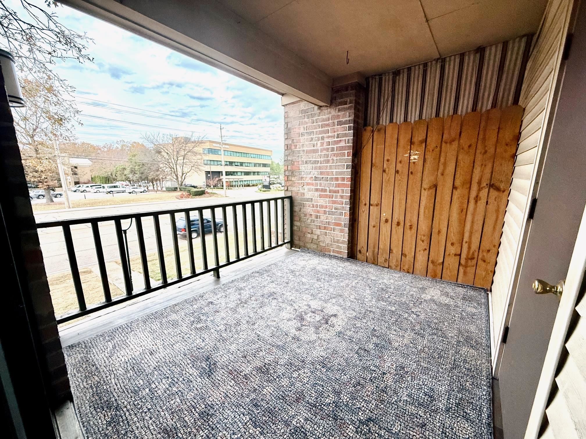 6571 Poplar Avenue, Unit 2 Germantown, TN 38138 - Photo 8 of 18 a view of a porch
