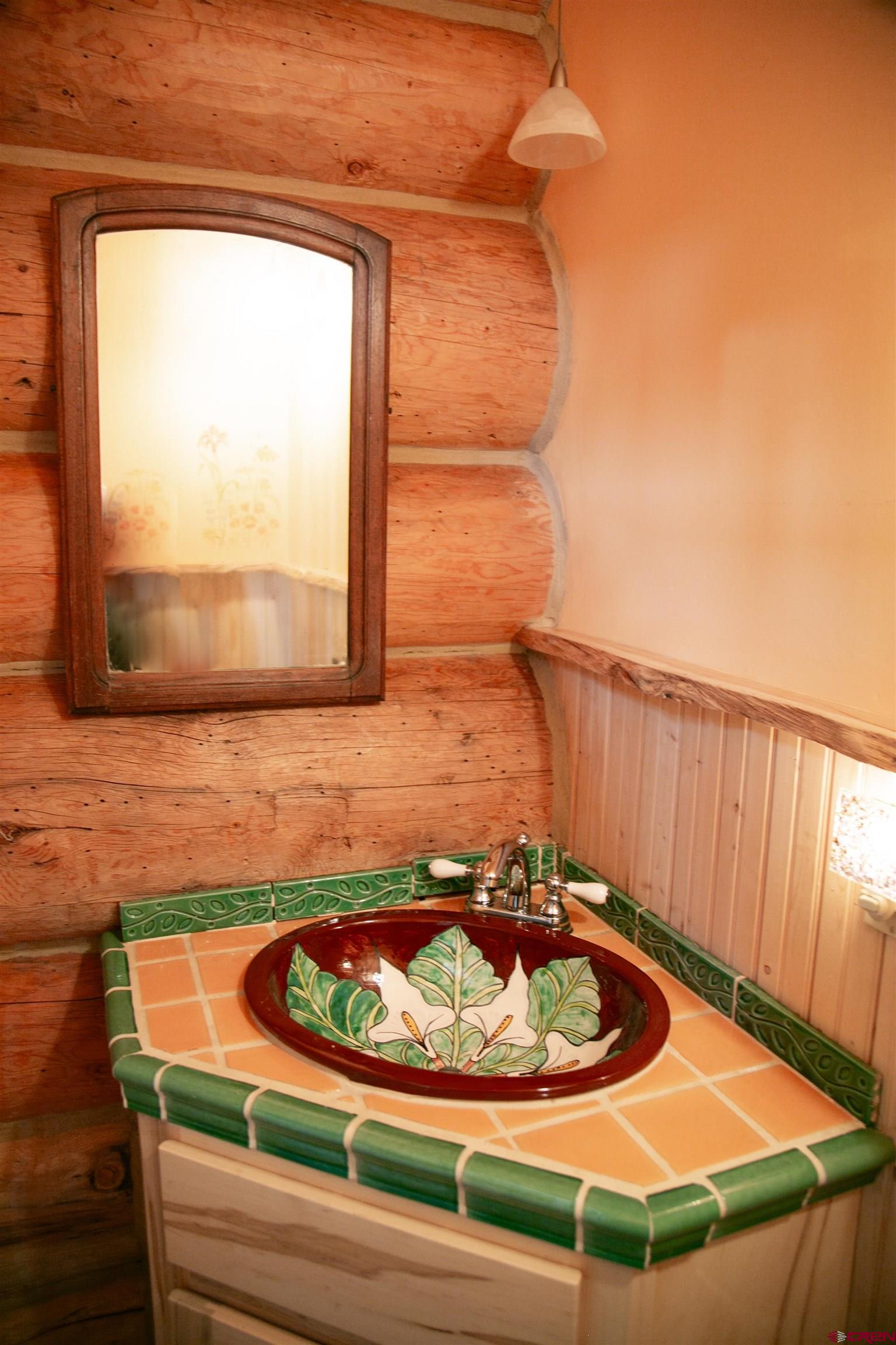 2250 Middle Creek Road Creede, CO 81130 - Photo 16 of 35 a room with a mirror and outdoor space