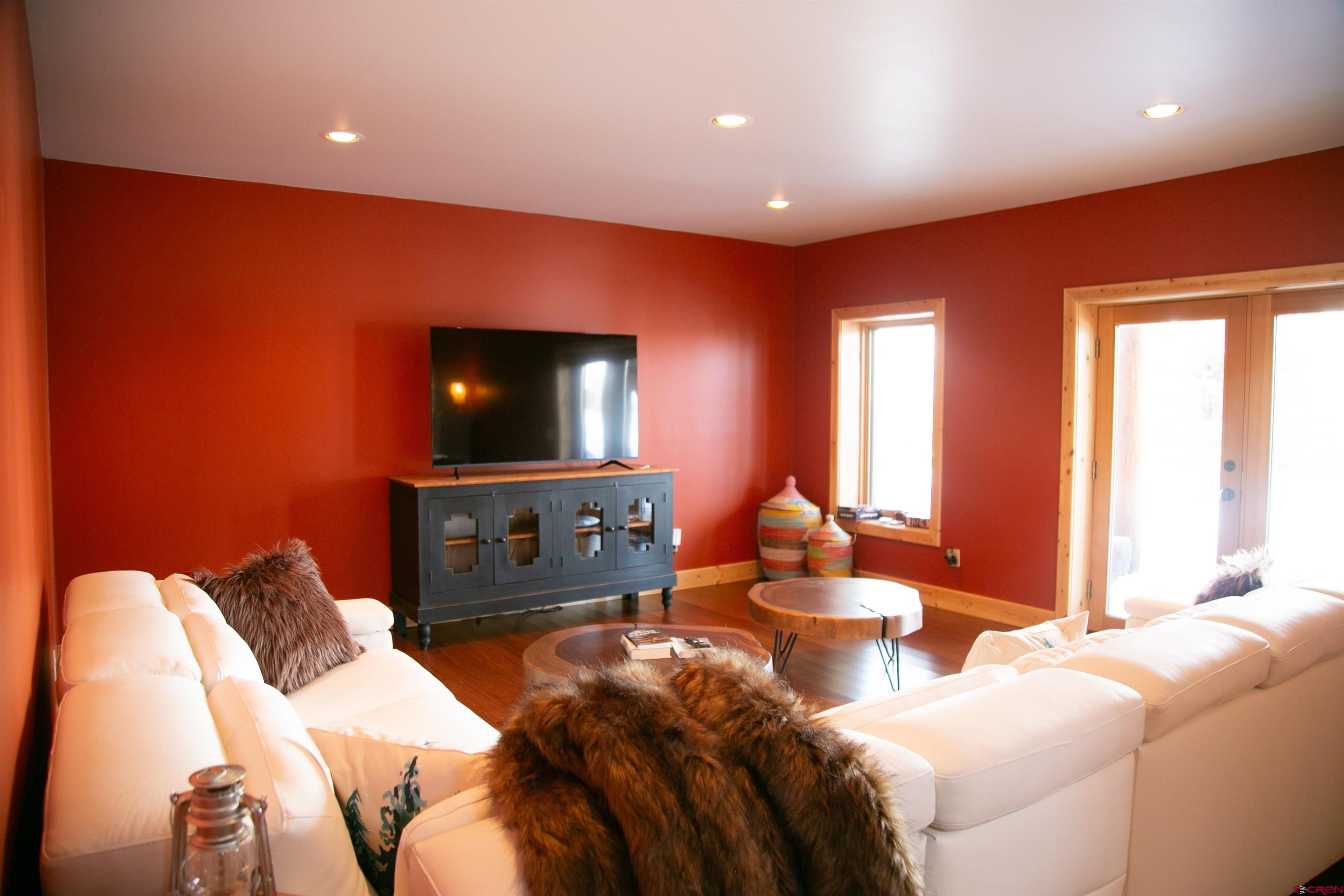 2250 Middle Creek Road Creede, CO 81130 - Photo 27 of 35 a living room with furniture and a flat screen tv
