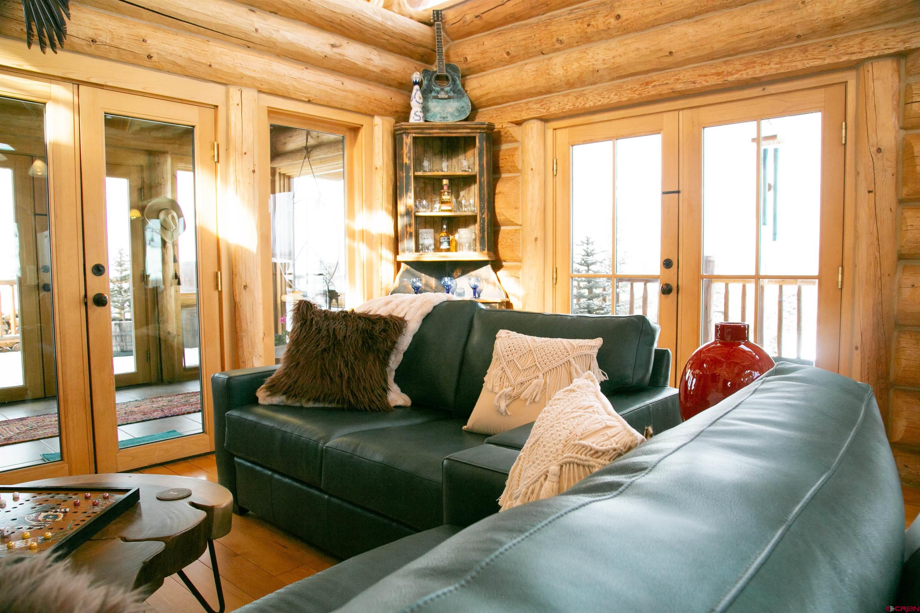 2250 Middle Creek Road Creede, CO 81130 - Photo 7 of 35 a living room with furniture and a large window