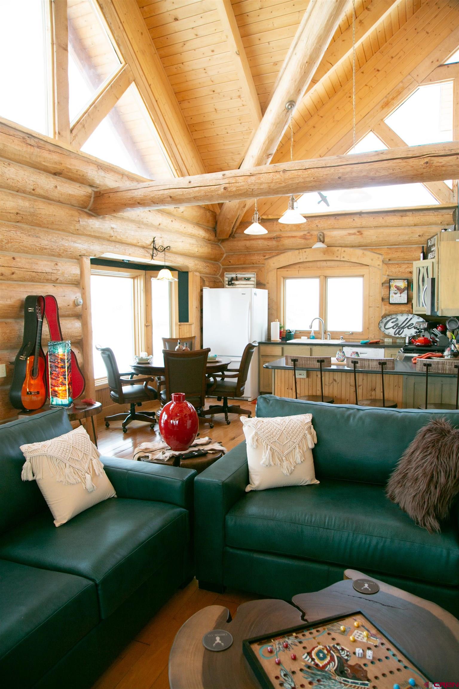 2250 Middle Creek Road Creede, CO 81130 - Photo 8 of 35 a living room with furniture and a floor to ceiling window
