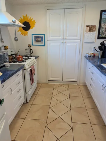 a bathroom with a toilet a sink and a mirror