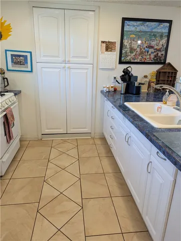 a view of a hallway with bathroom