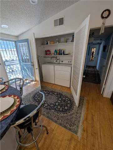 a white toilet sitting next to a bathroom sink