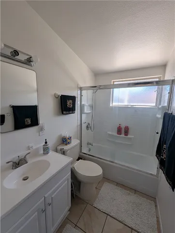 a bedroom with a bed and furniture