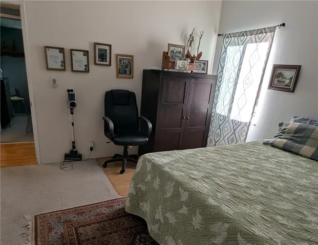 a view of a street with an ocean view