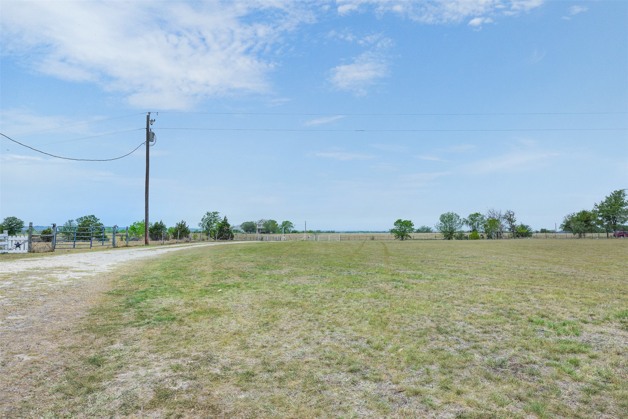 763 Upper Elgin River Road Elgin, TX 78621 - Photo 8 of 40 View of yard with a view of countryside