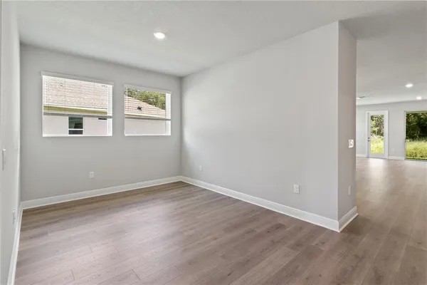 an empty room with windows
