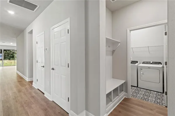 a utility room with dryer and washer