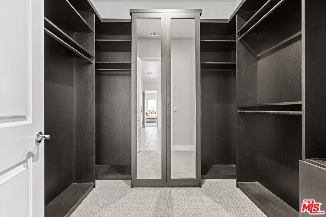 24220 Sterling Ranch Road West Hills, CA 91304 - Photo 19 of 39 a view of closet area