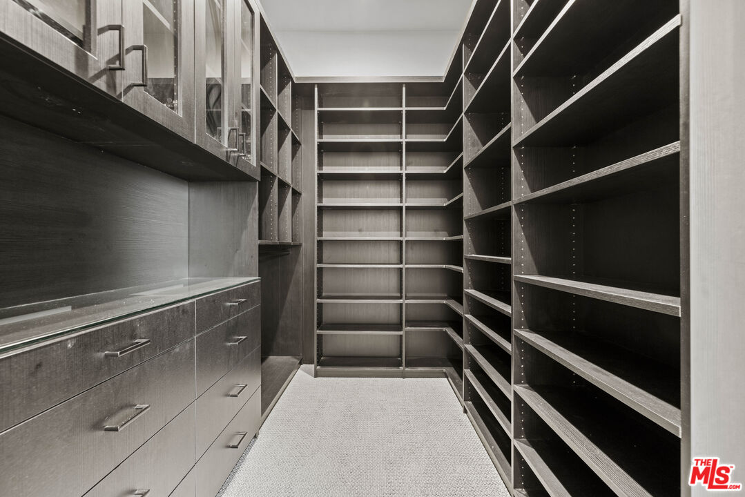 24220 Sterling Ranch Road West Hills, CA 91304 - Photo 20 of 39 a view of an empty walk in closet