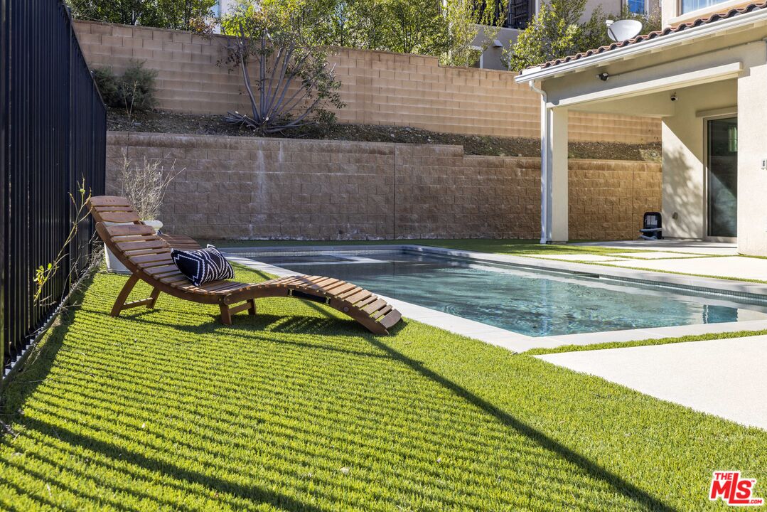 24220 Sterling Ranch Road West Hills, CA 91304 - Photo 37 of 39 a view of swimming pool from a lounge chair