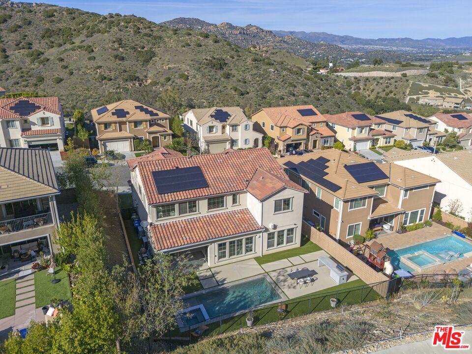 24220 Sterling Ranch Road West Hills, CA 91304 - Photo 6 of 39 an aerial view of residential houses with outdoor space
