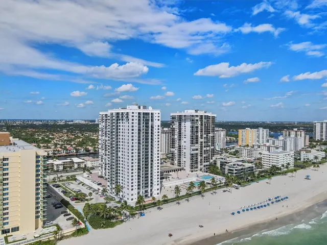 a view of a city with tall buildings