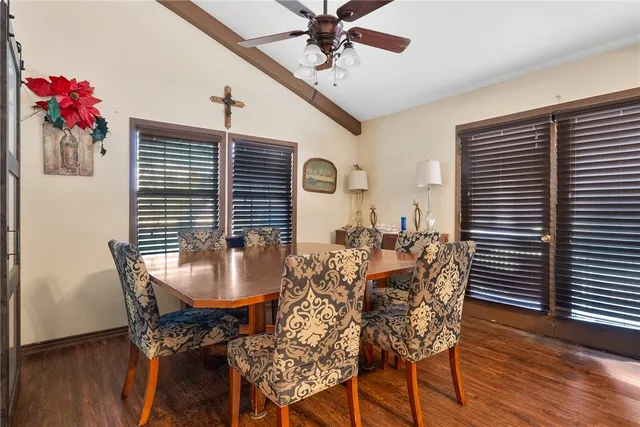 a kitchen with stainless steel appliances a refrigerator microwave and sink