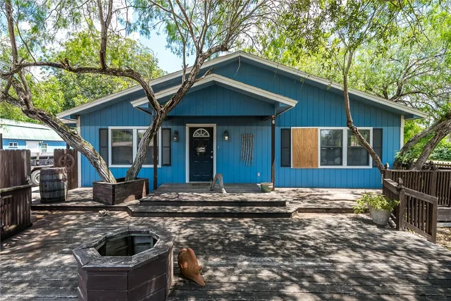 a view of a hallway with washer and dryer