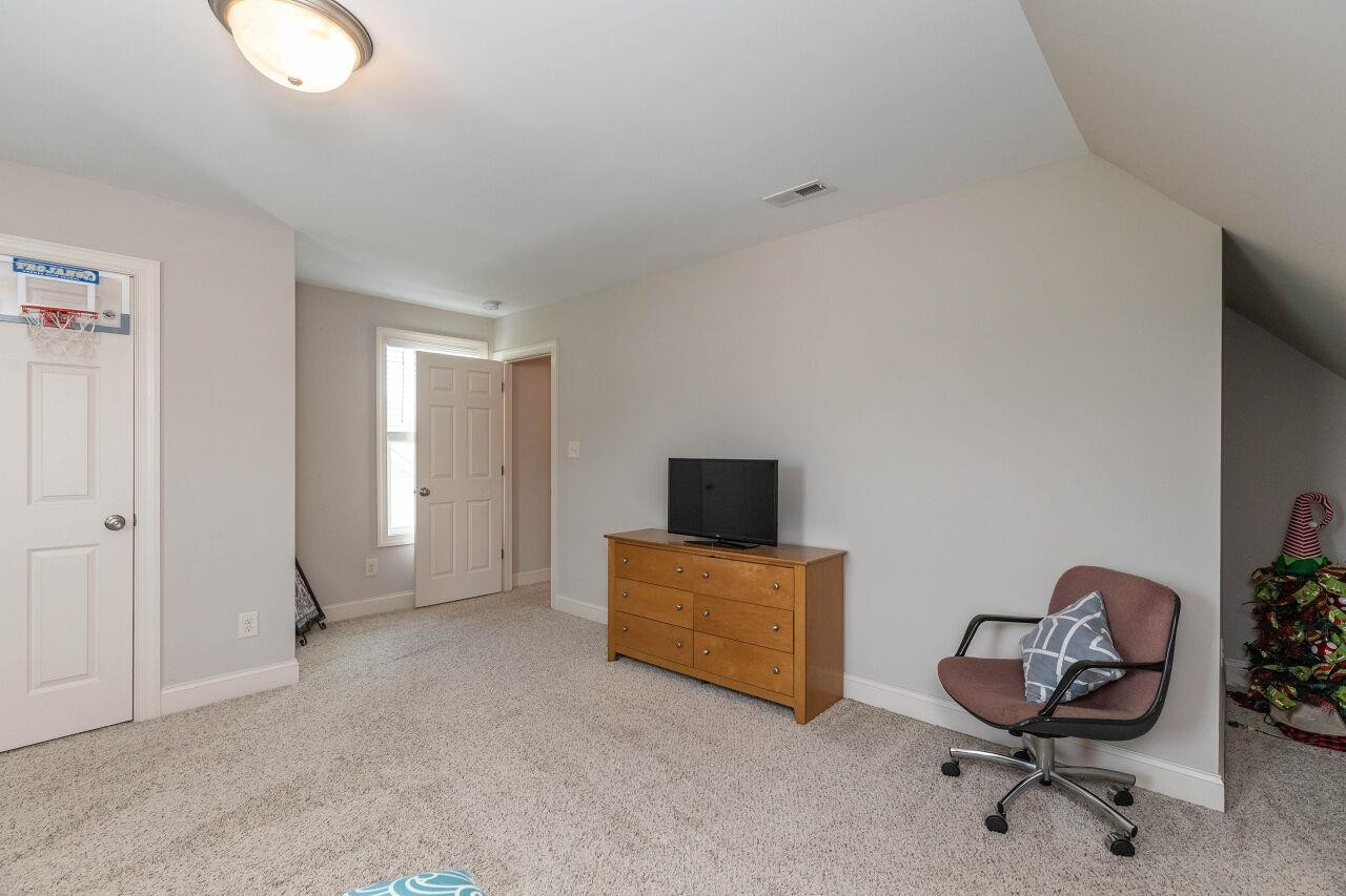 100 Celestial Drive Garner, NC 27529 - Photo 28 of 31 a view of workspace with livingroom