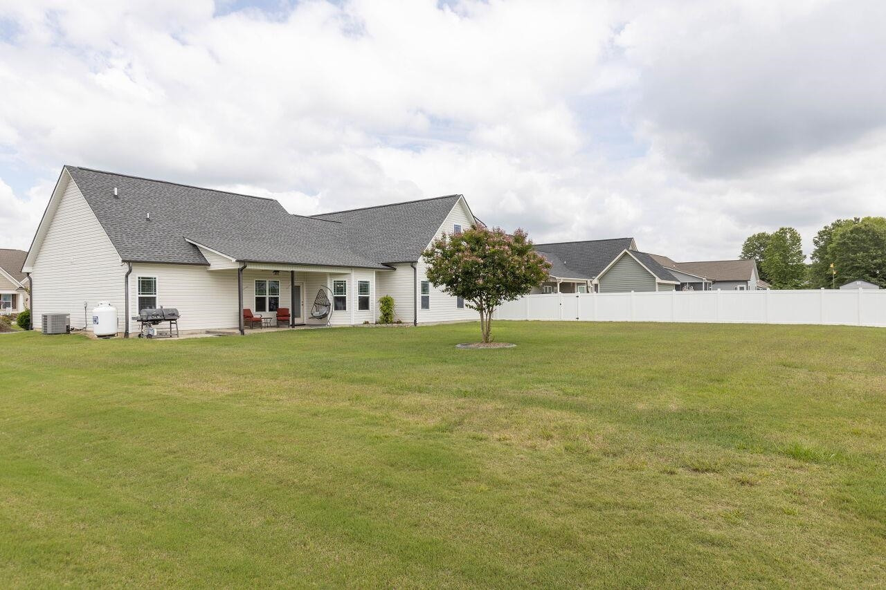 100 Celestial Drive Garner, NC 27529 - Photo 30 of 31 a view of a house with a swimming pool