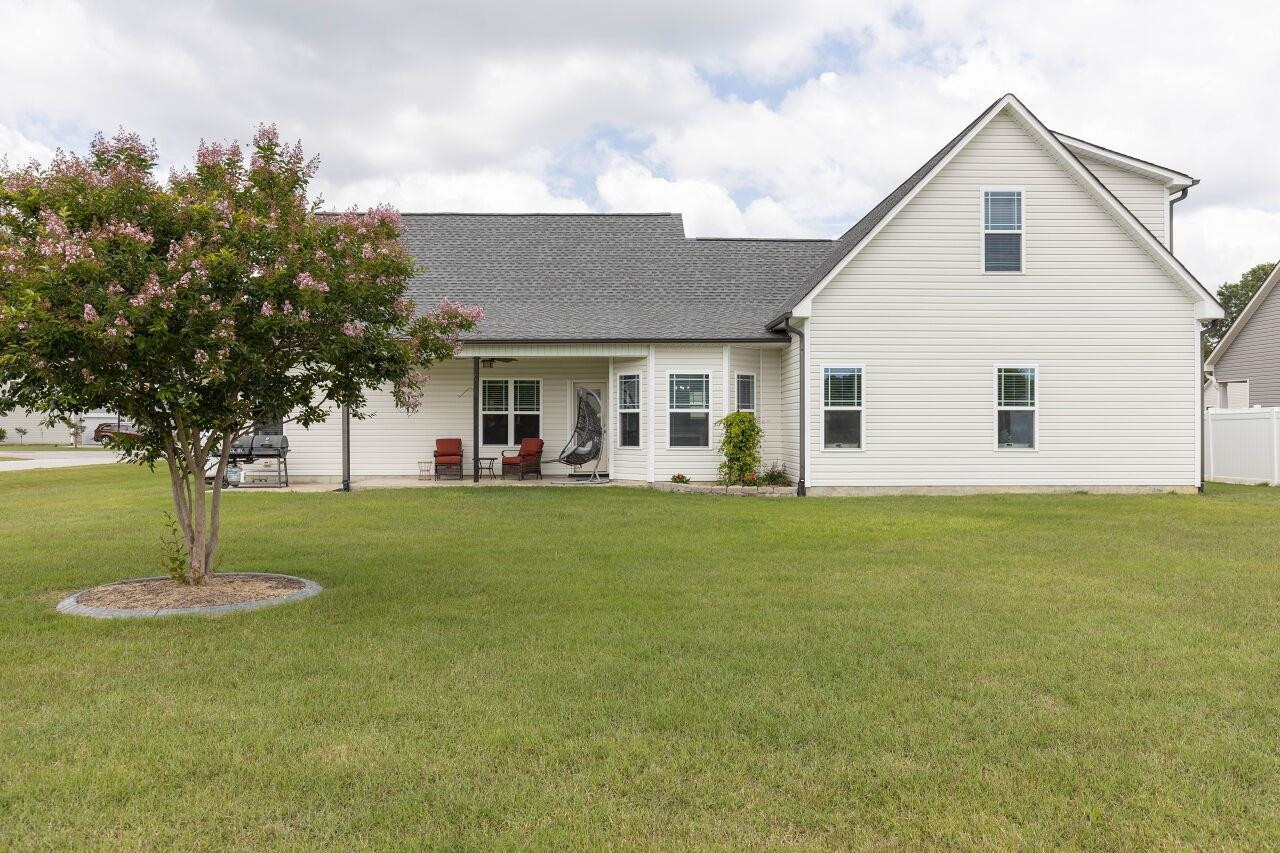 100 Celestial Drive Garner, NC 27529 - Photo 31 of 31 a front view of a house with a garden