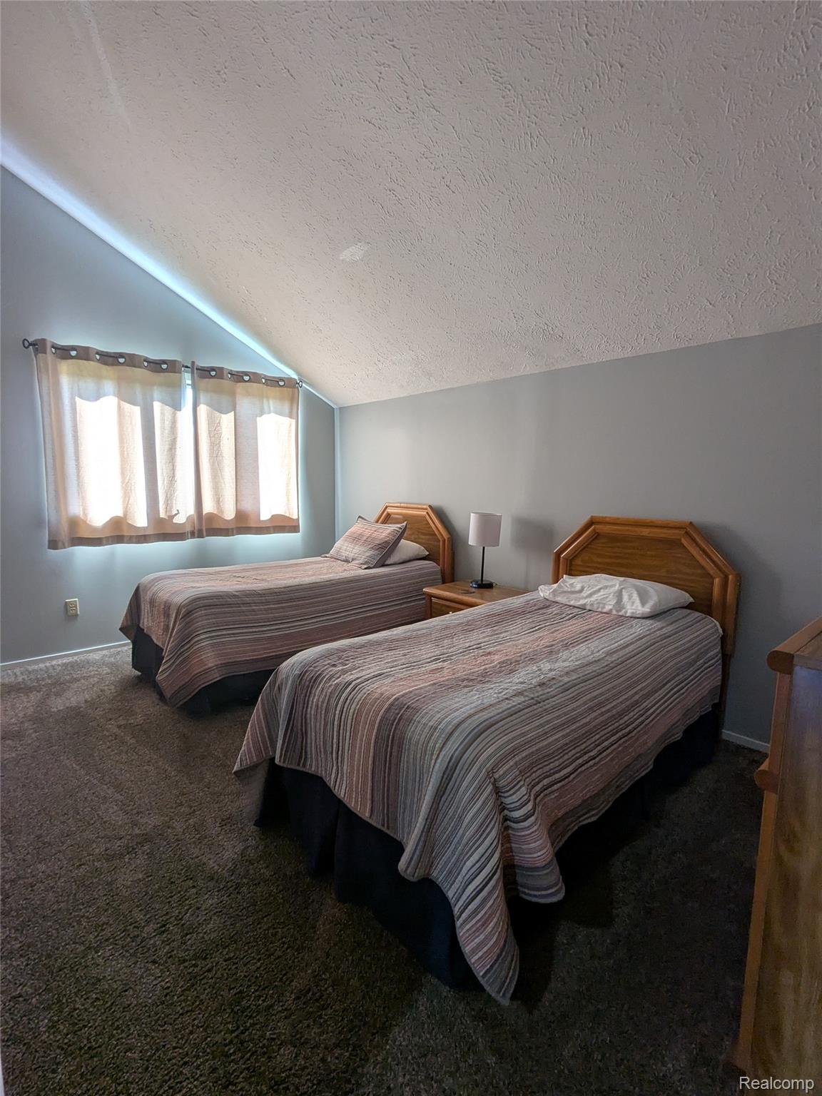 4749 South Pleasantview Road, Unit 20 Harbor Springs, MI 49740 - Photo 12 of 44 One of Two Main Level Bedrooms with Large Closet & Loft Area for Storage (If Desired)