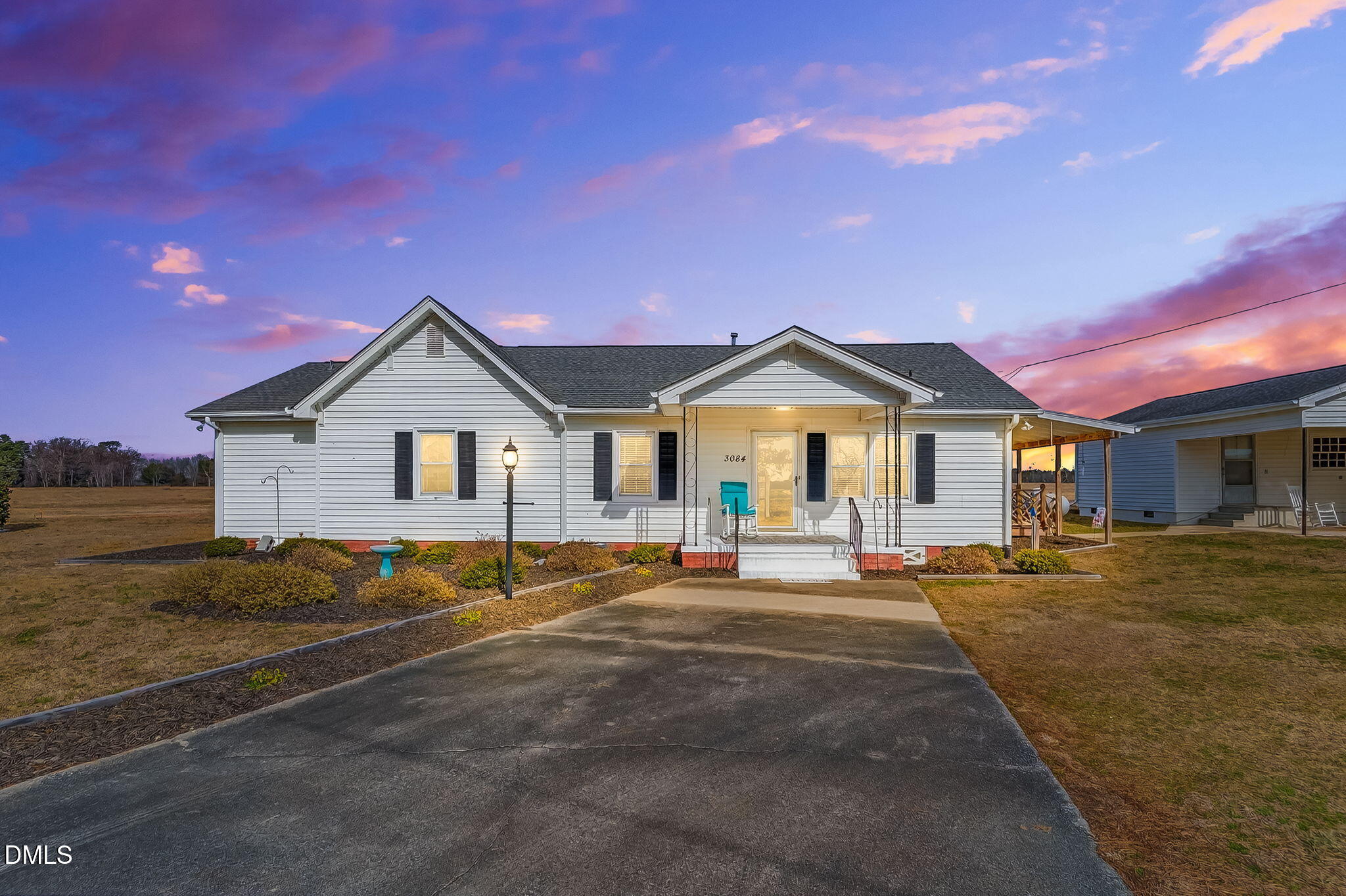 3084 Tarheel Road Benson, NC 27504 - Photo 1 of 37 a front view of a house with a street