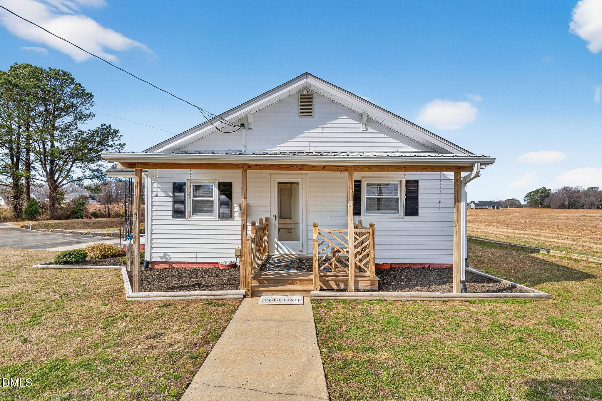 3084 Tarheel Road Benson, NC 27504 - Photo 26 of 37 a front view of house with yard