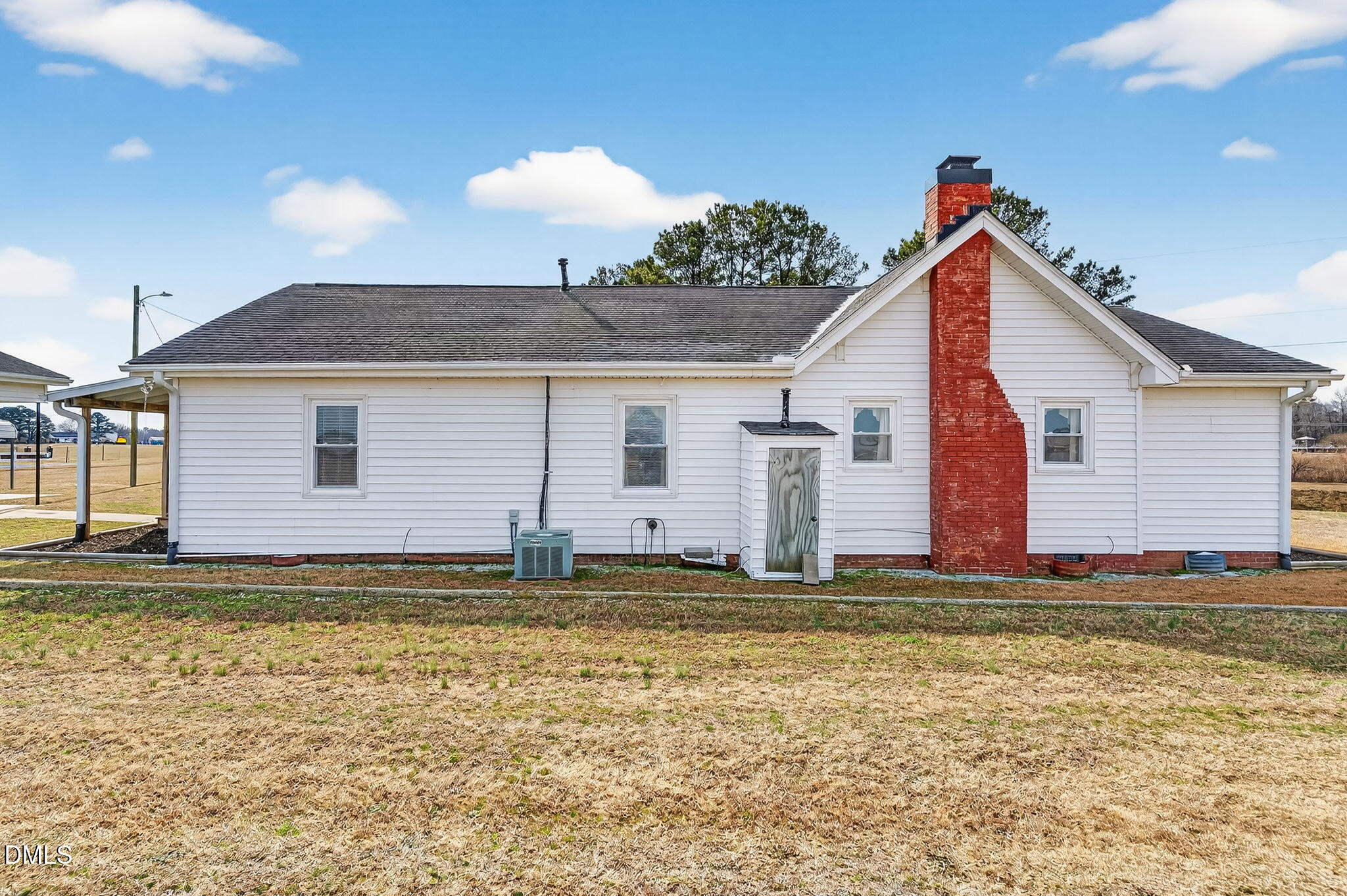 3084 Tarheel Road Benson, NC 27504 - Photo 28 of 37 a view of a house with a yard
