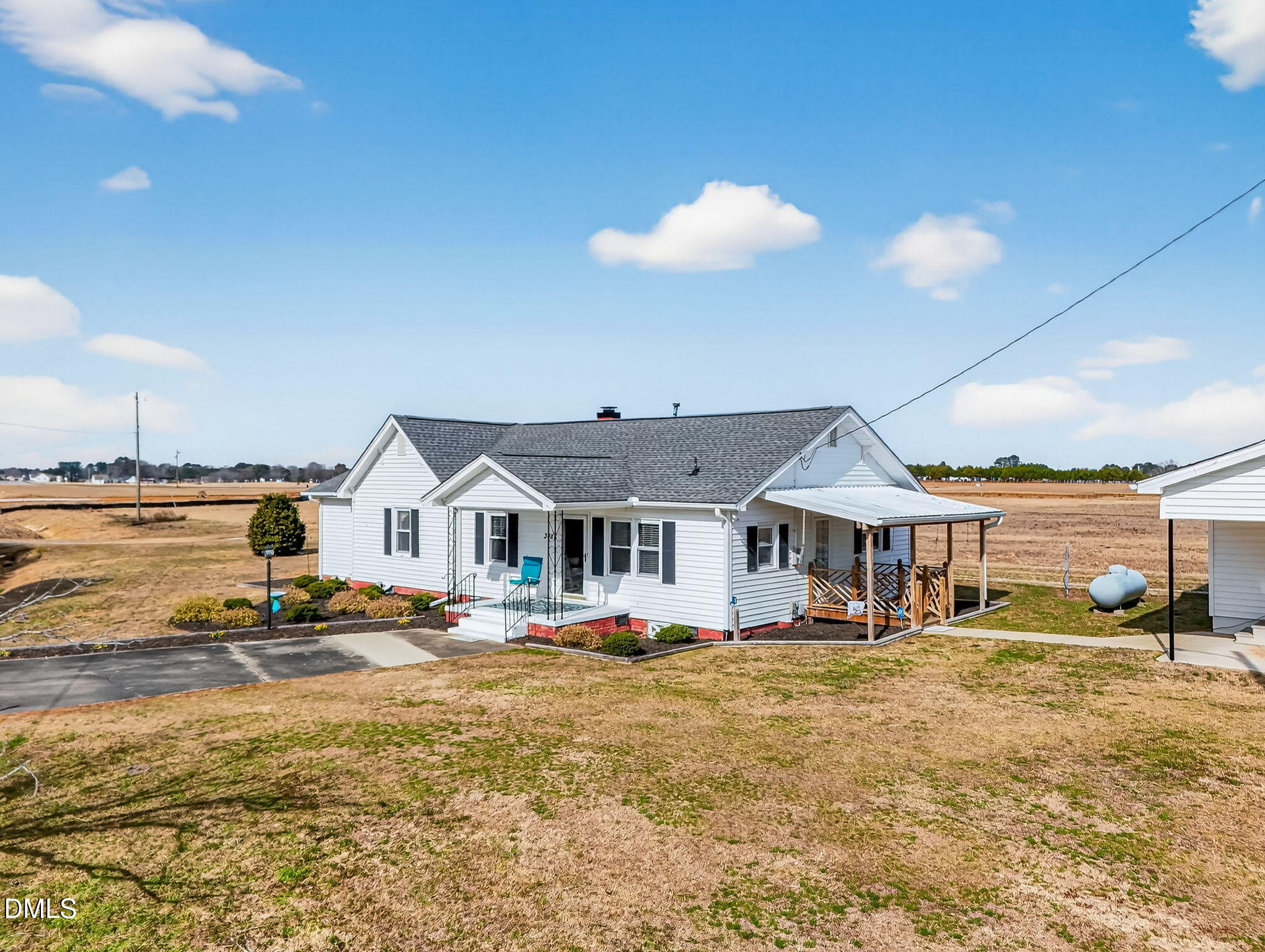 3084 Tarheel Road Benson, NC 27504 - Photo 31 of 37 a front view of a building with street view