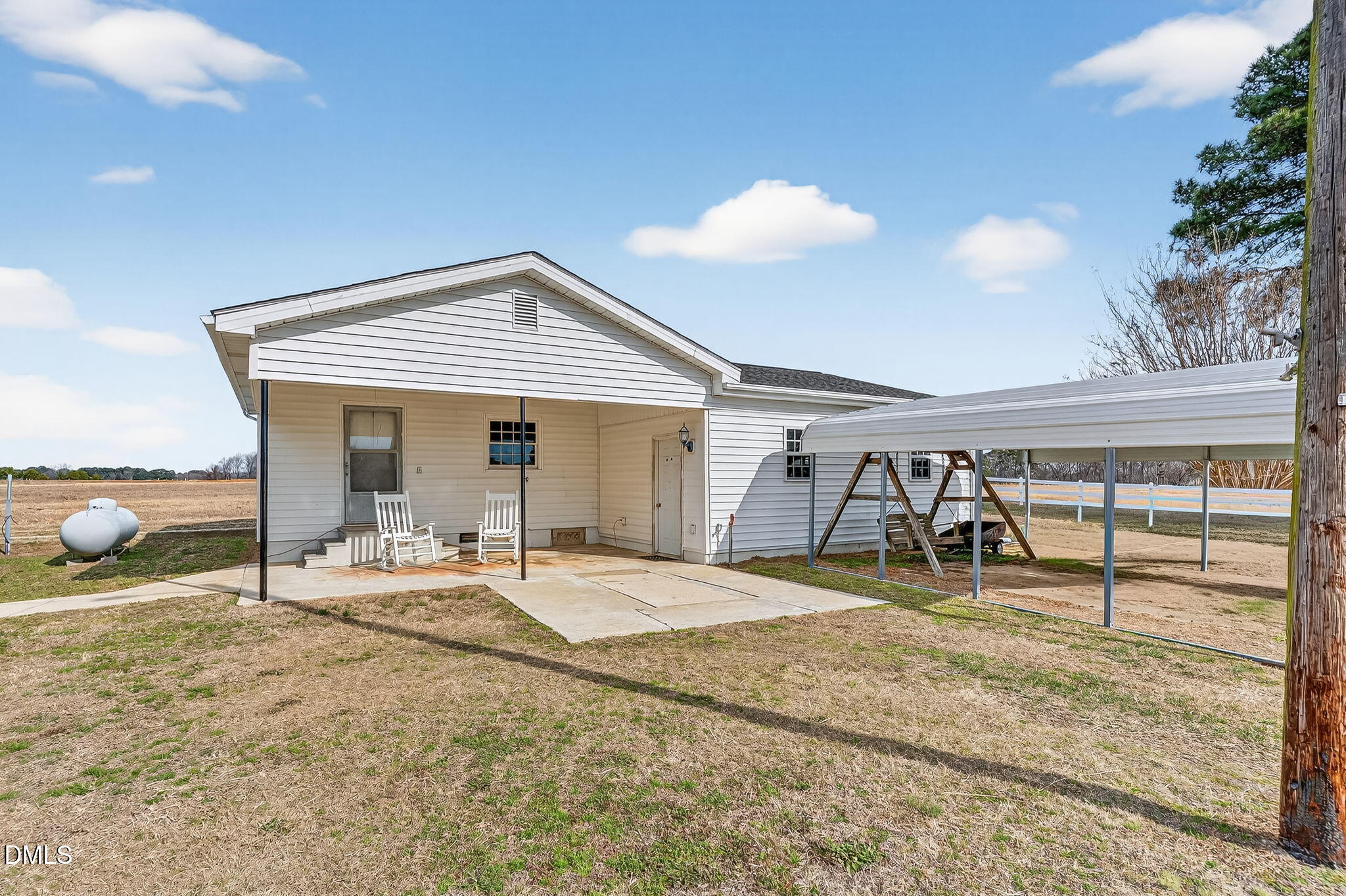 3084 Tarheel Road Benson, NC 27504 - Photo 33 of 37 a house view with a outdoor space