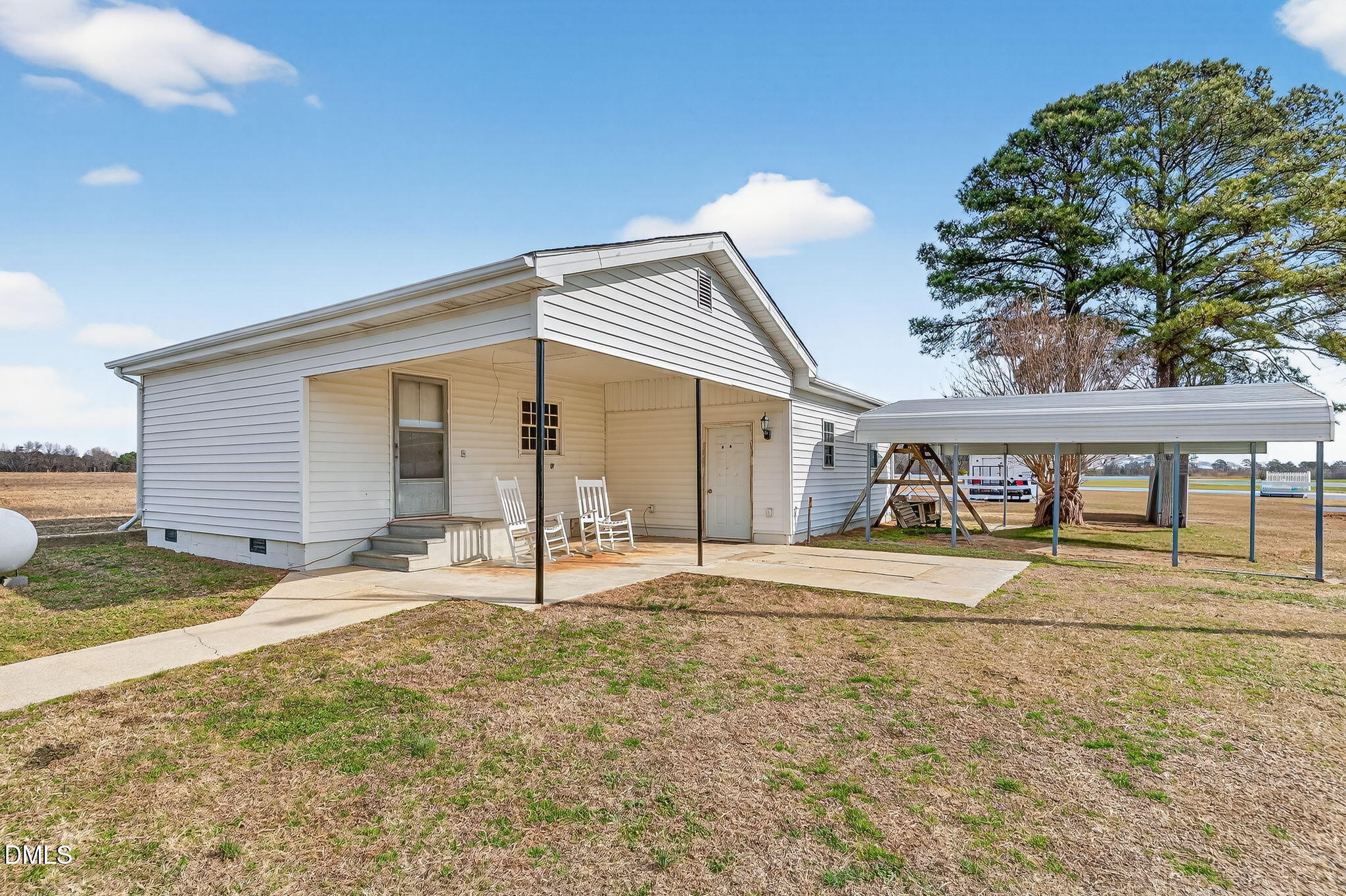 3084 Tarheel Road Benson, NC 27504 - Photo 34 of 37 a house view with a outdoor space