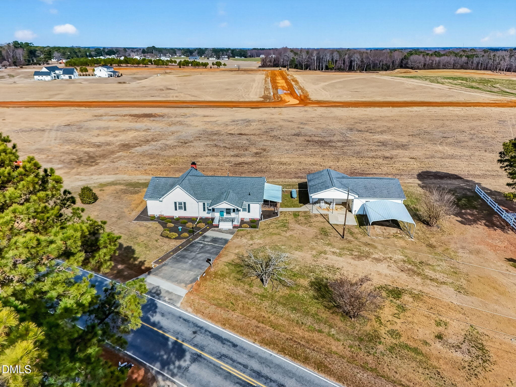 3084 Tarheel Road Benson, NC 27504 - Photo 35 of 37 a view of an ocean and beach