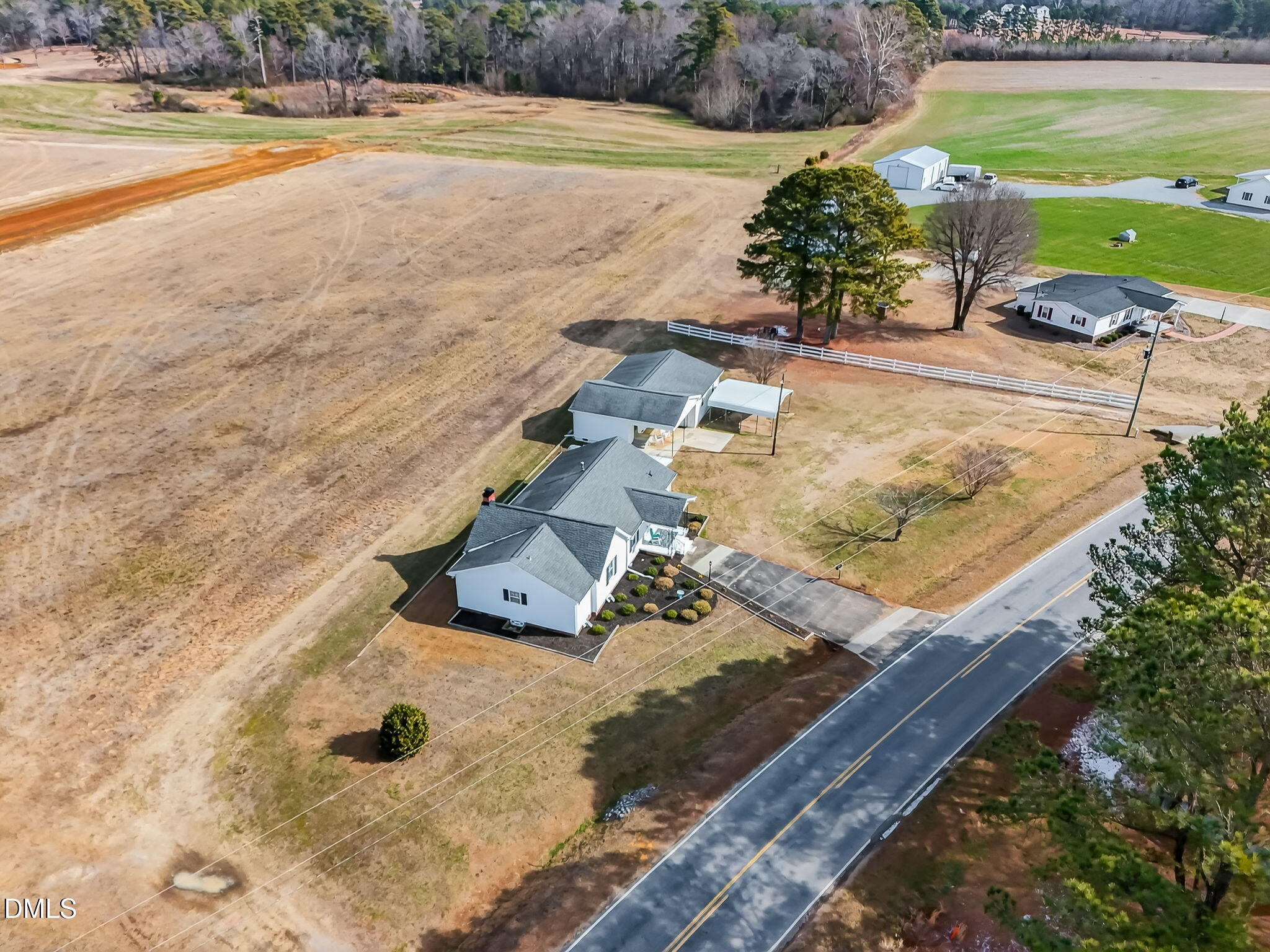 3084 Tarheel Road Benson, NC 27504 - Photo 37 of 37 a view of a yard with an outdoor space